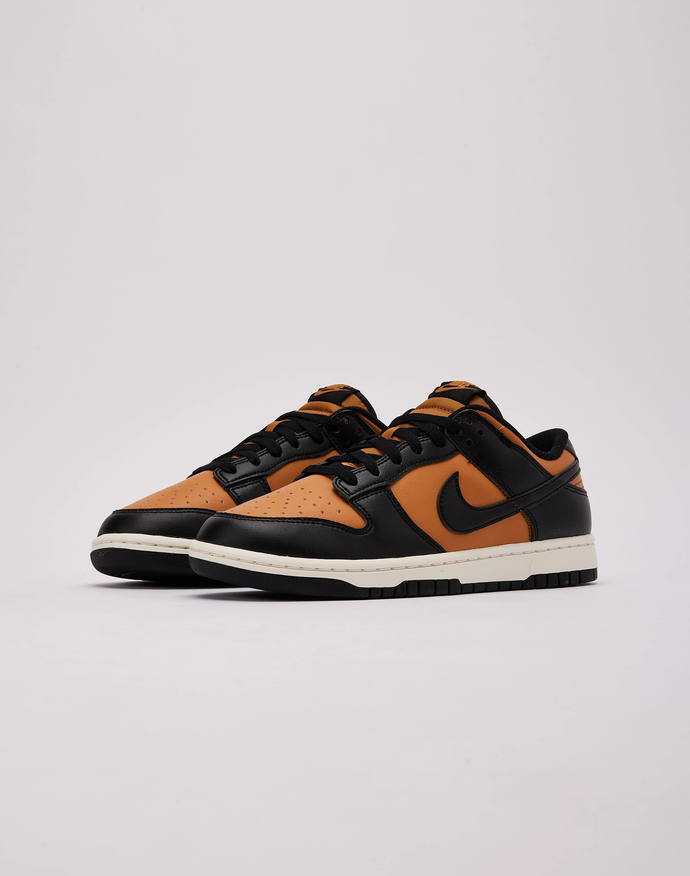 Nike Dunk Low Designer rollerblading