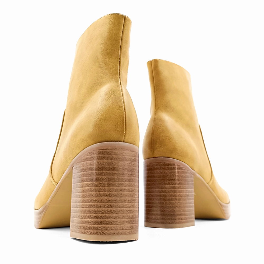 Vernita Round Toe Platform Zippered Boots Stabilizing Outrigger